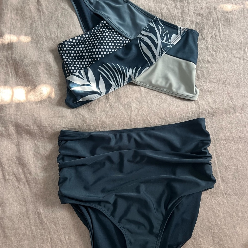 Stylish Women's Swimwear Set - soft teal and light blue.